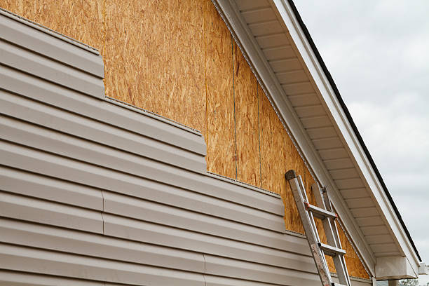 Professional Fiber Cement Siding technician working in South Boston, MA